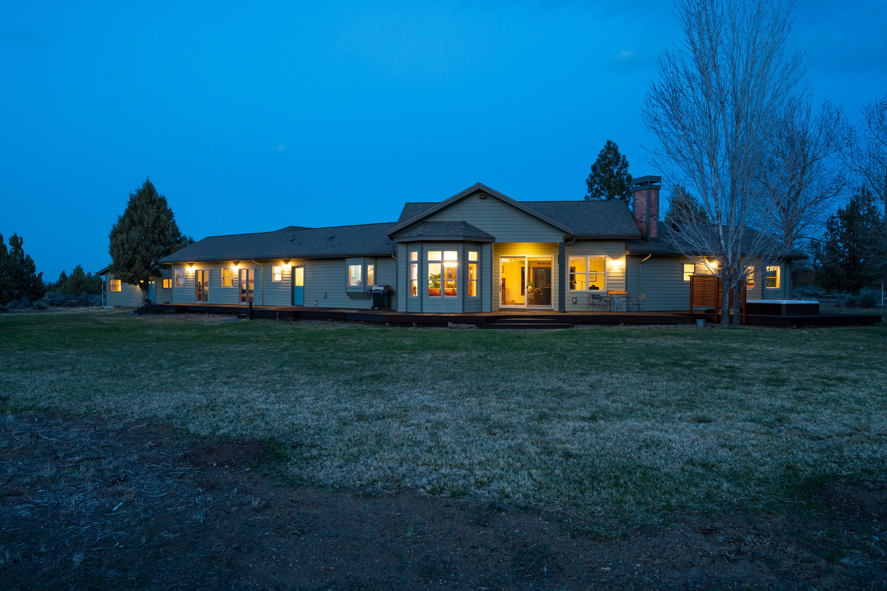 66360 Jericho Road Bend, OR 97703 - Photo 3 of 100 a front view of house with yard and porch