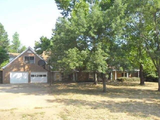 100 North Mt Carmel Road Hampton, GA 30228 - Photo 1 of 1 a view of a house with a yard