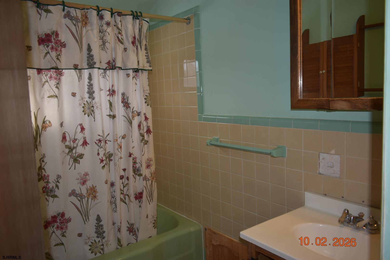 319 Barr Avenue Linwood, NJ 08221 - Photo 16 of 19 a bathroom with a shower and a sink