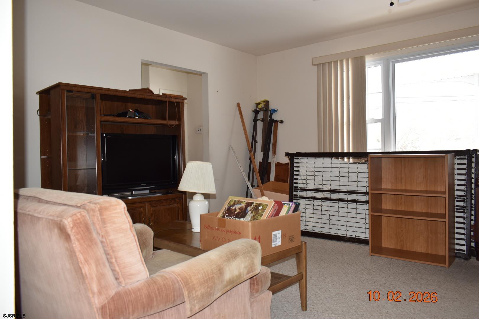319 Barr Avenue Linwood, NJ 08221 - Photo 6 of 19 a living room with furniture and a window