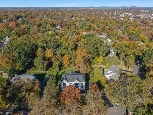 an aerial view of residential house with outdoor space