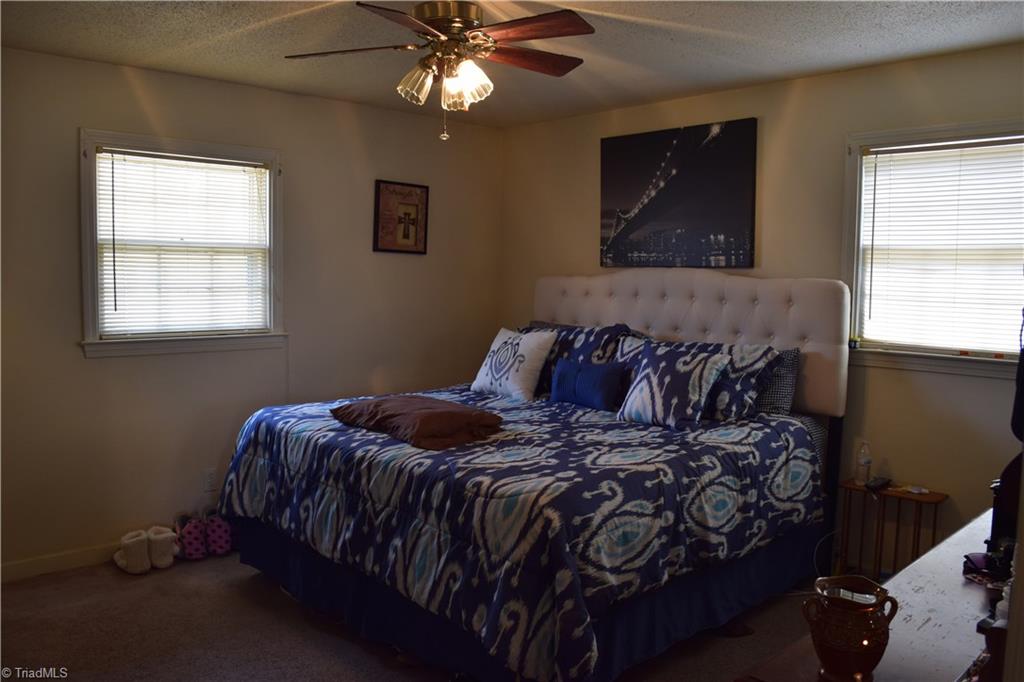 249 Deadmon Road Mocksville, NC 27028 - Photo 14 of 16 Spacious master bedroom with attached half bath