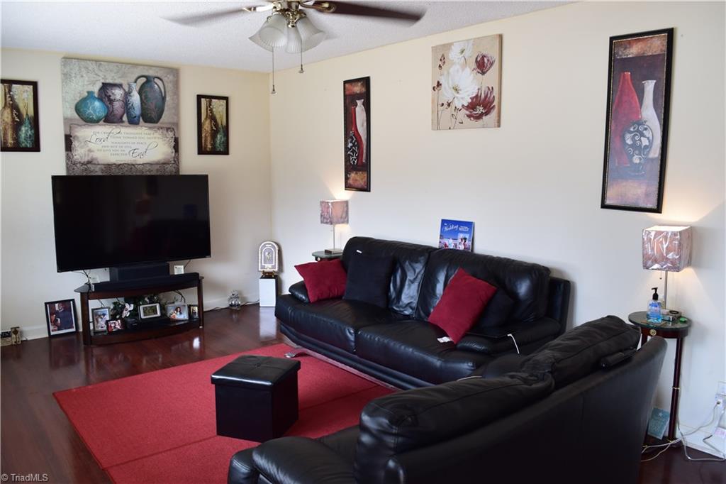 249 Deadmon Road Mocksville, NC 27028 - Photo 15 of 16 Bright, spacious family room with large windows