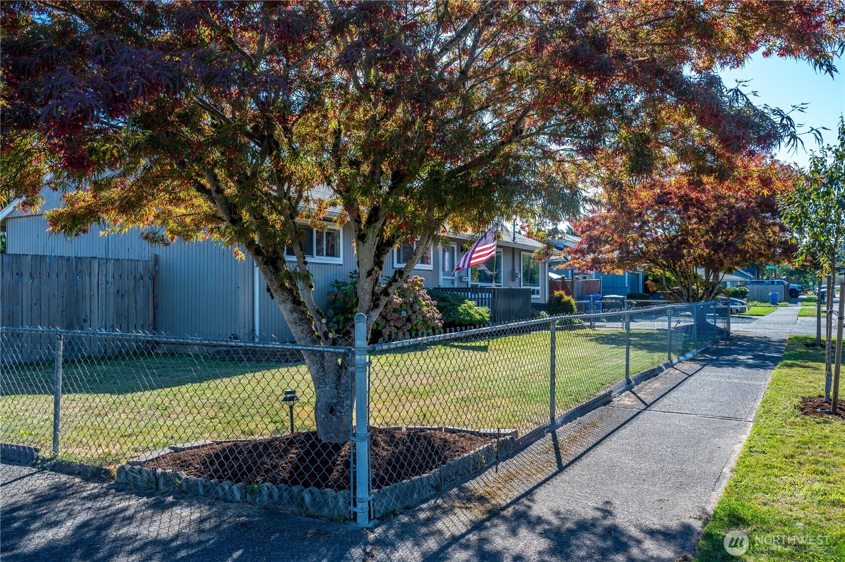 1610 16th Street Sumner, WA 98390 - Photo 23 of 28 a view of a backyard with swimming pool