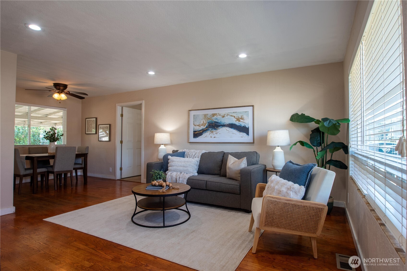 1610 16th Street Sumner, WA 98390 - Photo 4 of 28 a living room with furniture potted plant and a window