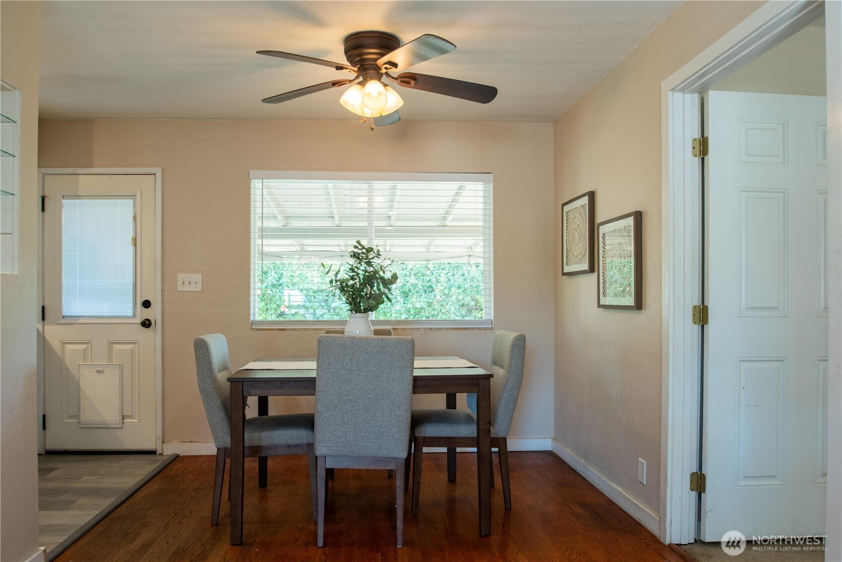 1610 16th Street Sumner, WA 98390 - Photo 6 of 28 a view of a dining room with furniture window and wooden floor
