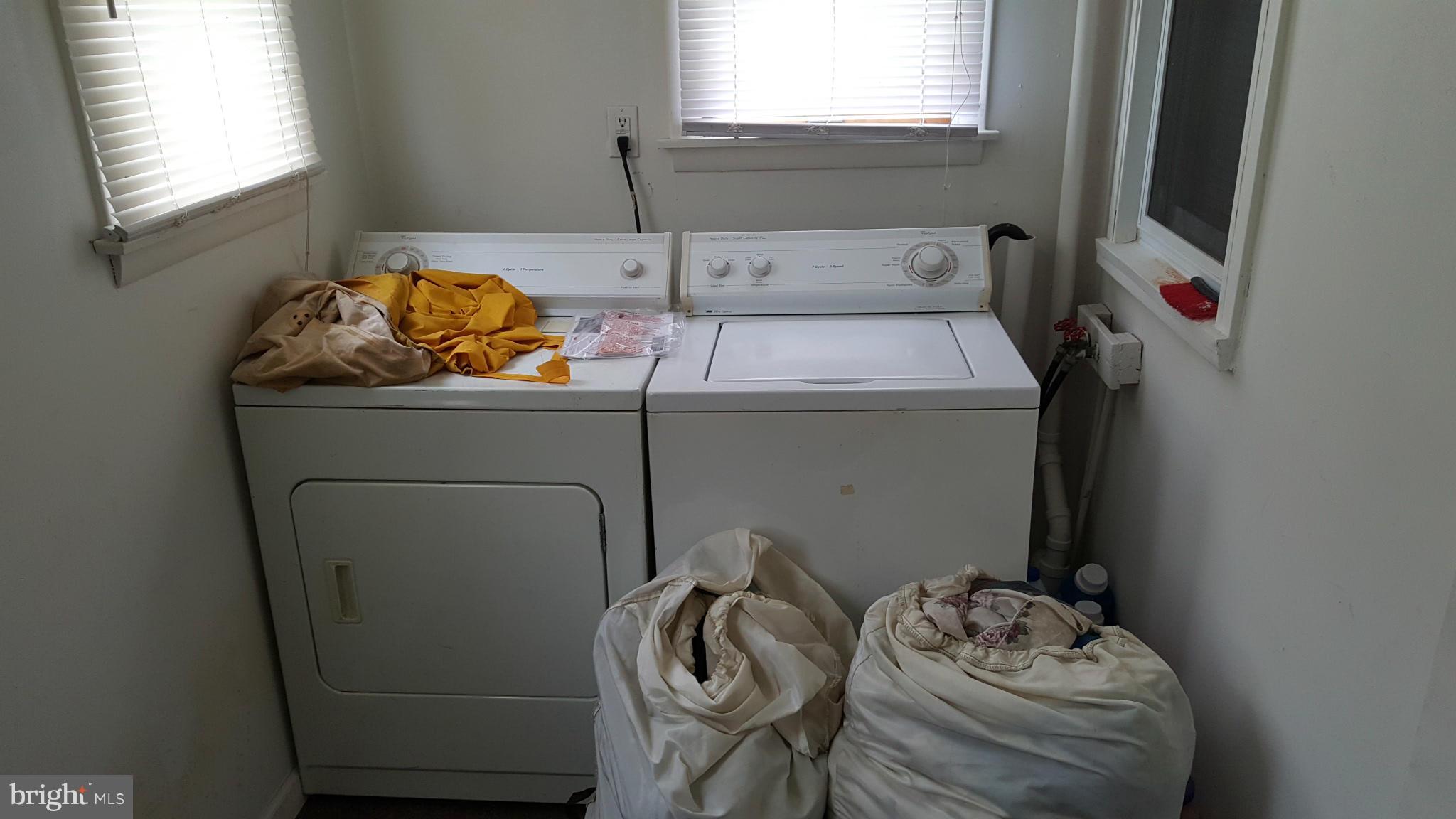 8220 Cornwall Road Baltimore, MD 21222 - Photo 14 of 17 a utility room with dryer and washer