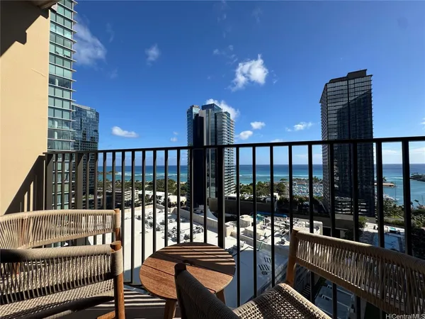 a view of a balcony with chairs