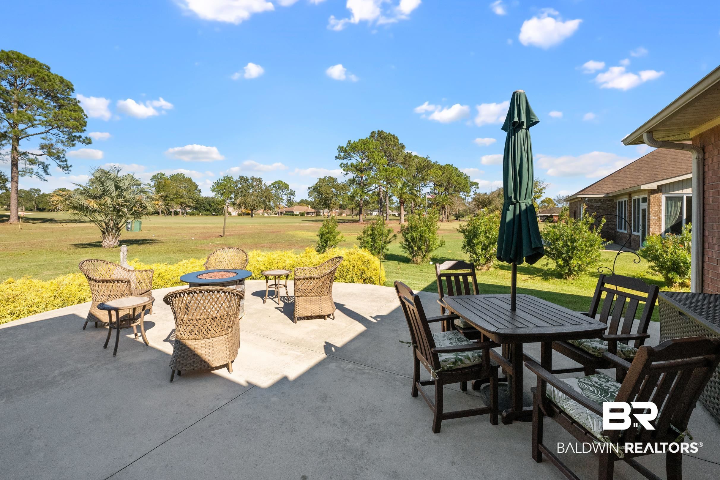 22355 East County Road 12 Foley, AL 36535 - Photo 46 of 54 View of patio with a fire pit and outdoor dining area