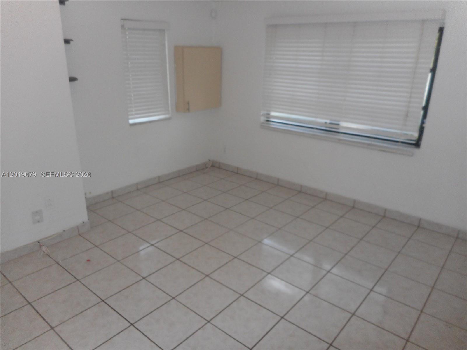 420 88th Street Surfside, FL 33154 - Photo 19 of 33 a view of a small space and window