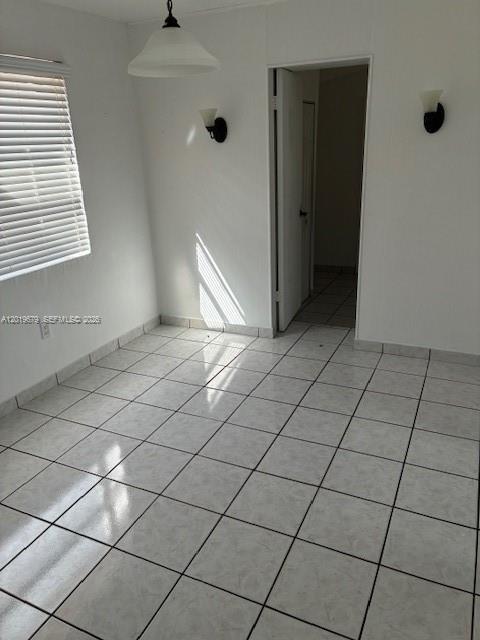 420 88th Street Surfside, FL 33154 - Photo 23 of 33 a view of an empty room and window