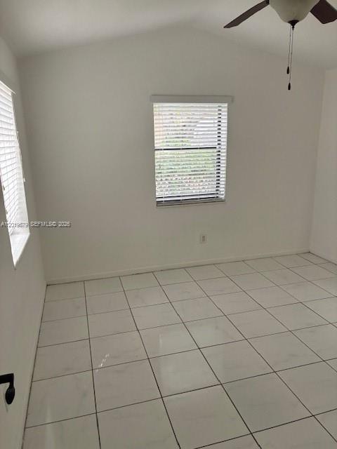 420 88th Street Surfside, FL 33154 - Photo 32 of 33 an empty room with white walls and tiles