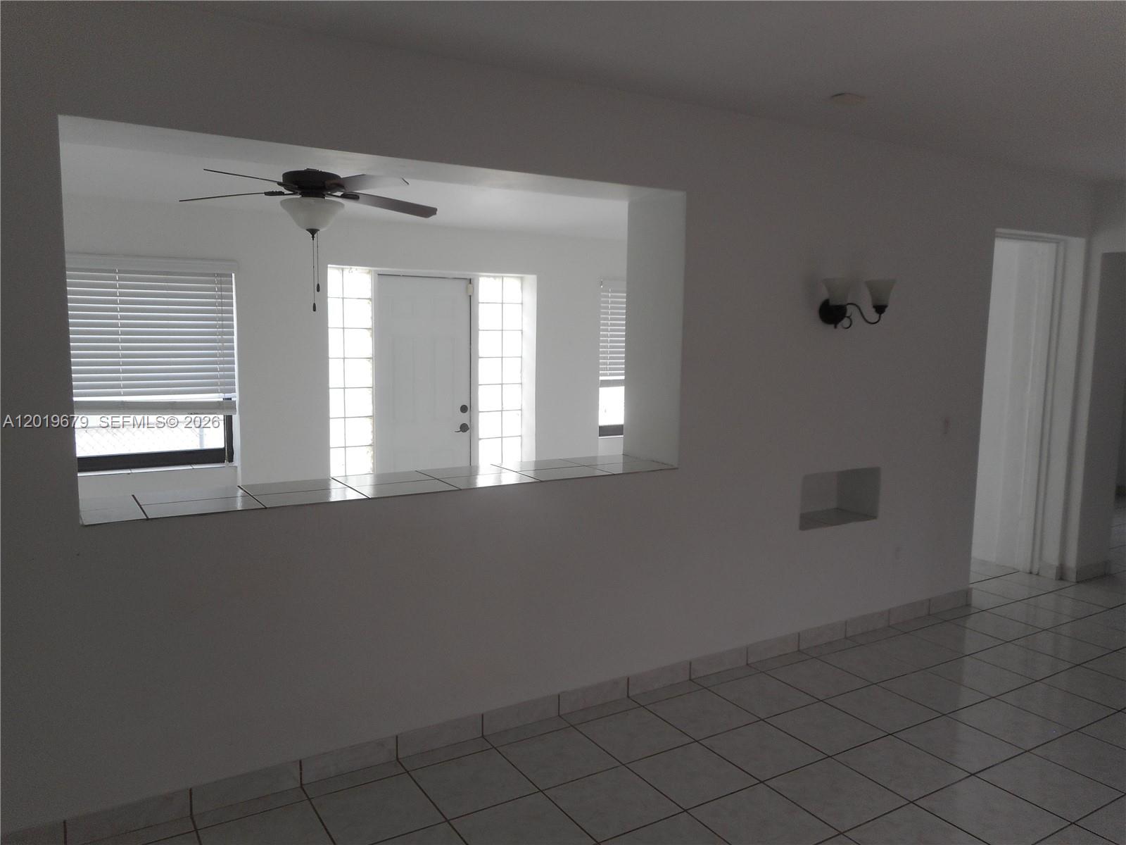 420 88th Street Surfside, FL 33154 - Photo 5 of 33 a view of an empty room with a window