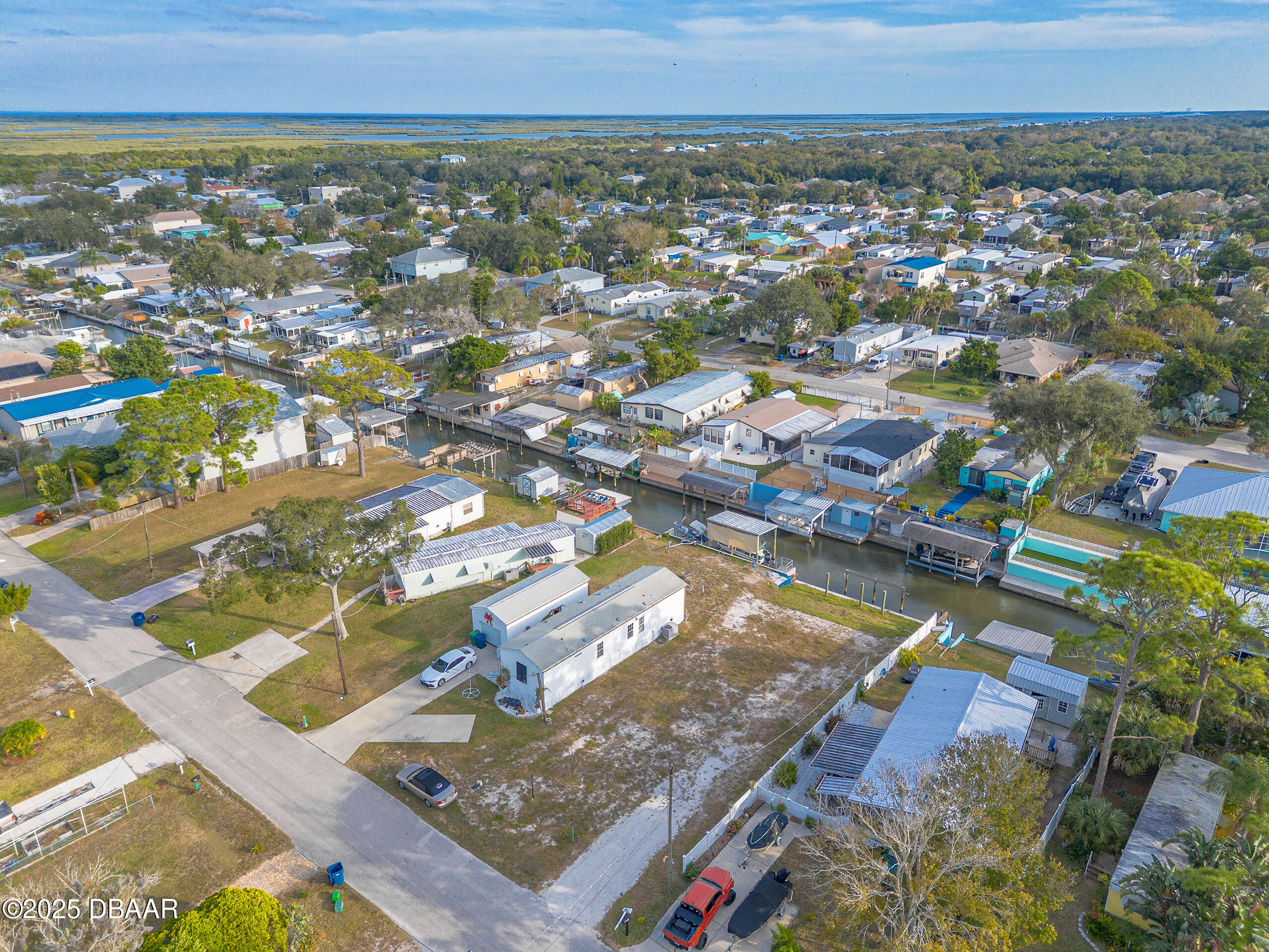 118 Coleman Street Edgewater, FL 32141 - Photo 3 of 15 an aerial view of residential houses with outdoor space