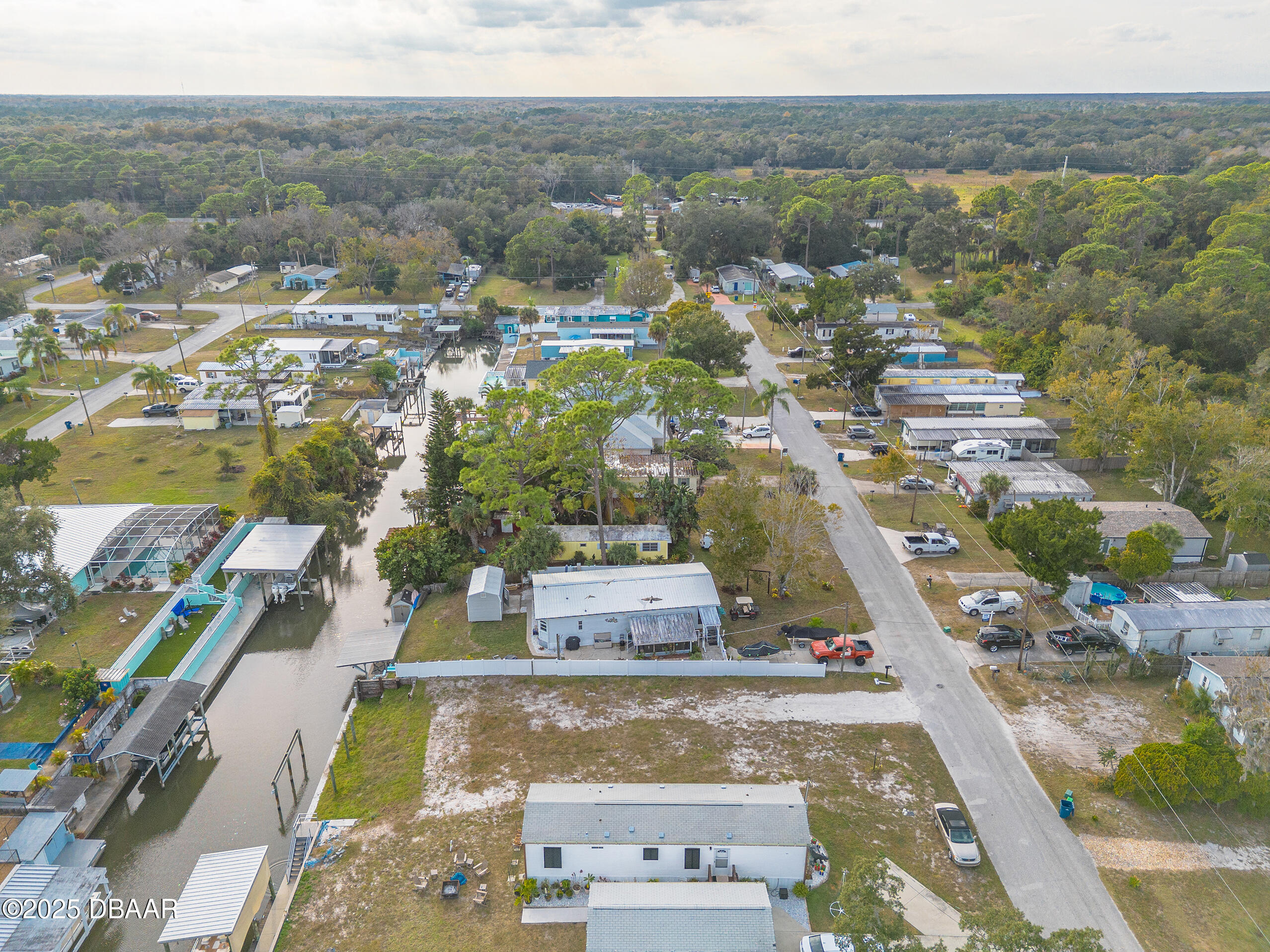 118 Coleman Street Edgewater, FL 32141 - Photo 8 of 15 an aerial view of residential houses with outdoor space