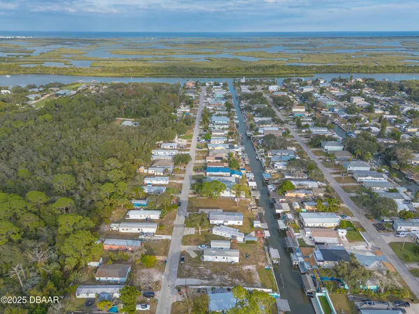 a view of swimming pool with a lounge chair