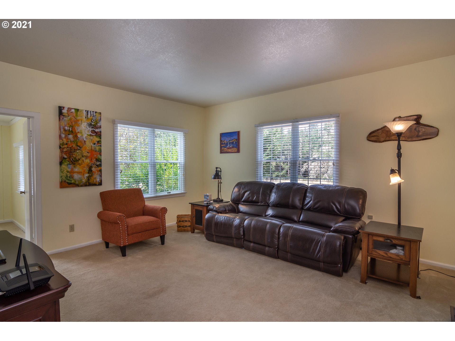 5852 Scotts Valley Road Yoncalla, OR 97499 - Photo 25 of 32 a living room with furniture and a window