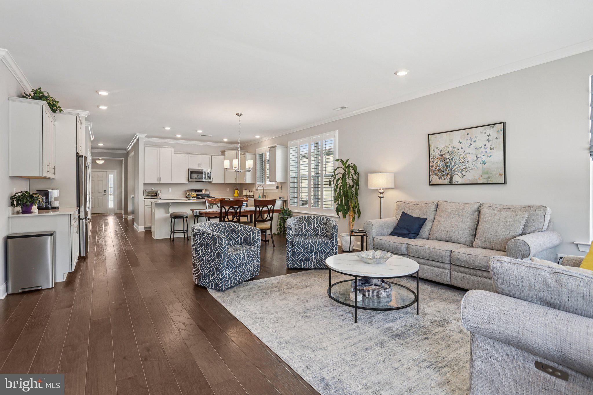 38 Tower Boulevard Mount Holly, NJ 08060 - Photo 11 of 42 a living room with furniture and kitchen view