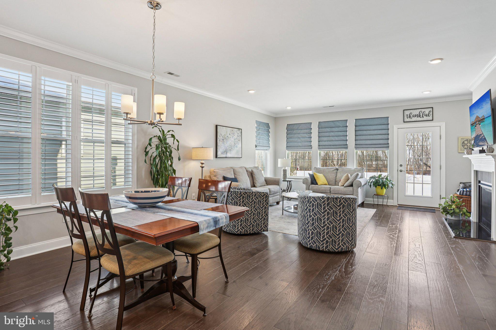 38 Tower Boulevard Mount Holly, NJ 08060 - Photo 12 of 42 a living room with furniture dining table and a large window