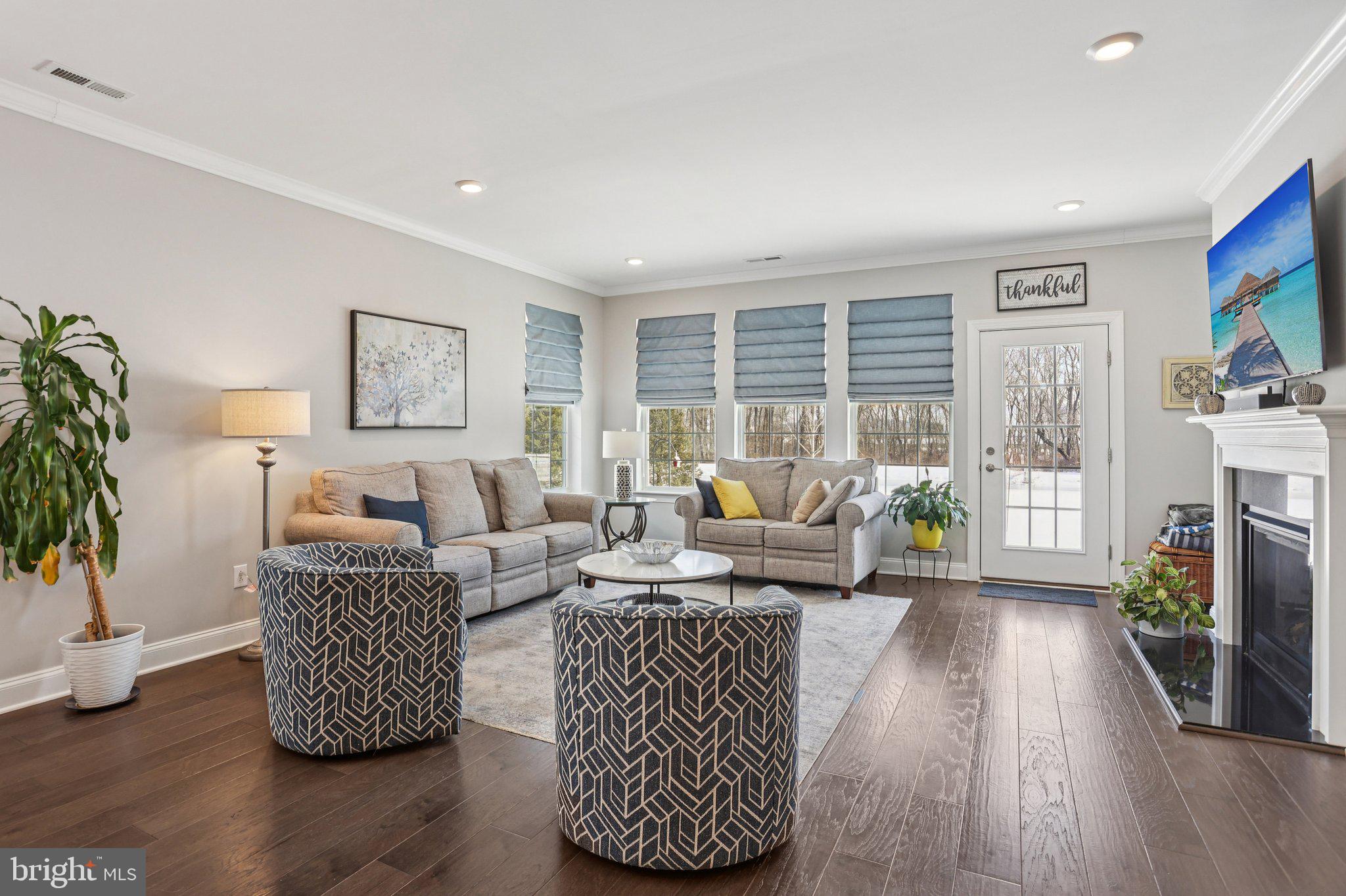 38 Tower Boulevard Mount Holly, NJ 08060 - Photo 13 of 42 a living room with furniture and a flat screen tv