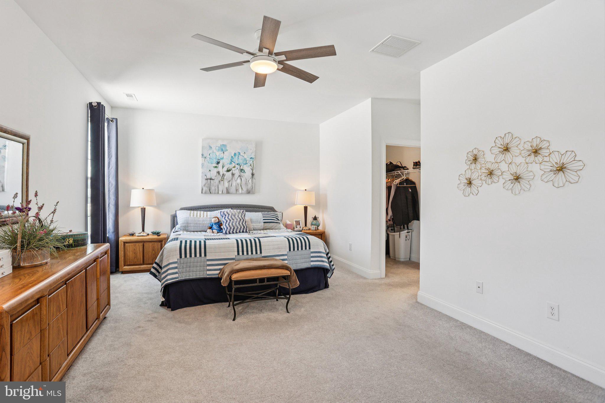 38 Tower Boulevard Mount Holly, NJ 08060 - Photo 24 of 42 a spacious bedroom with a bed and a chandelier