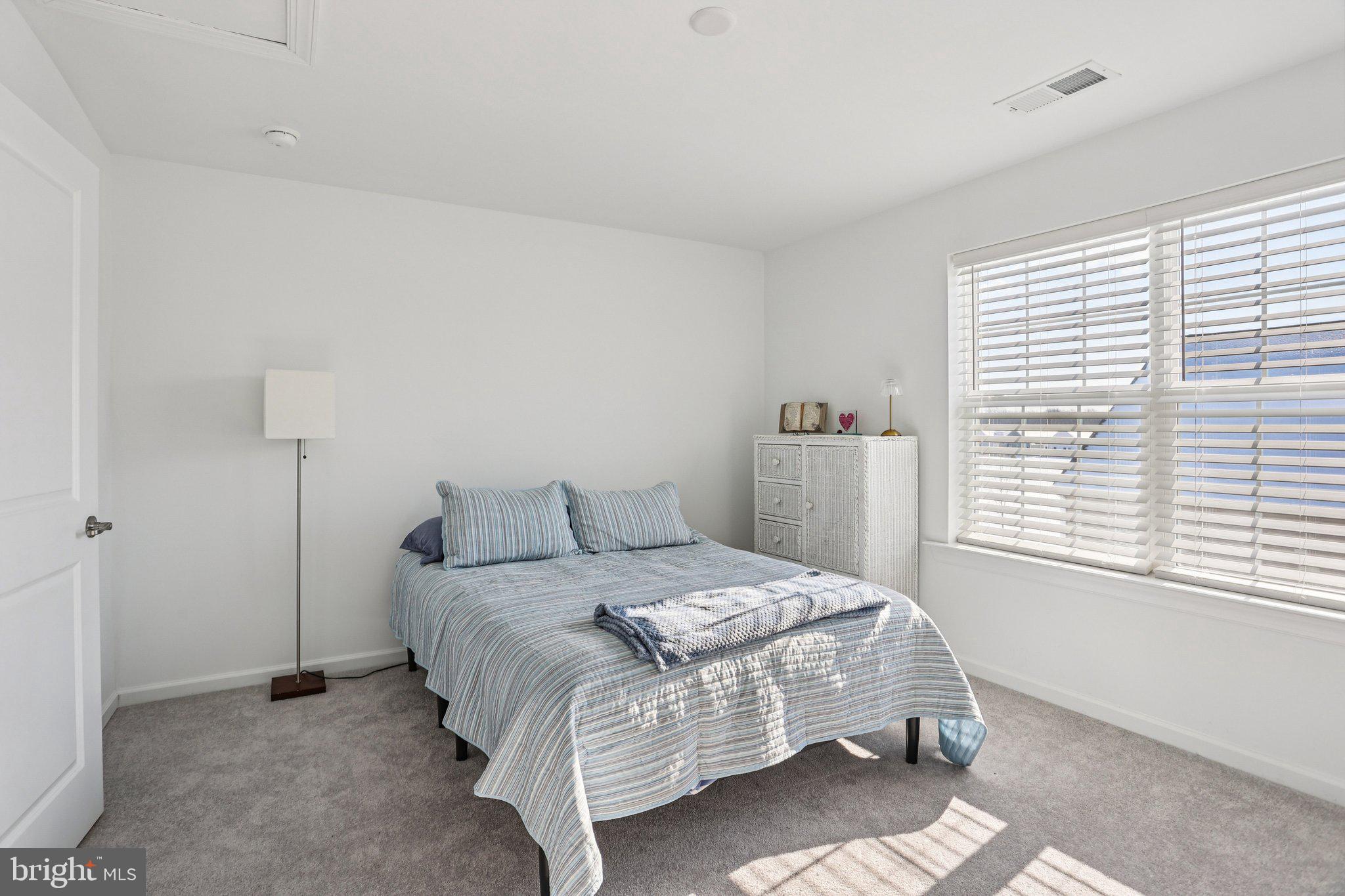 38 Tower Boulevard Mount Holly, NJ 08060 - Photo 35 of 42 a bedroom with a bed and a window