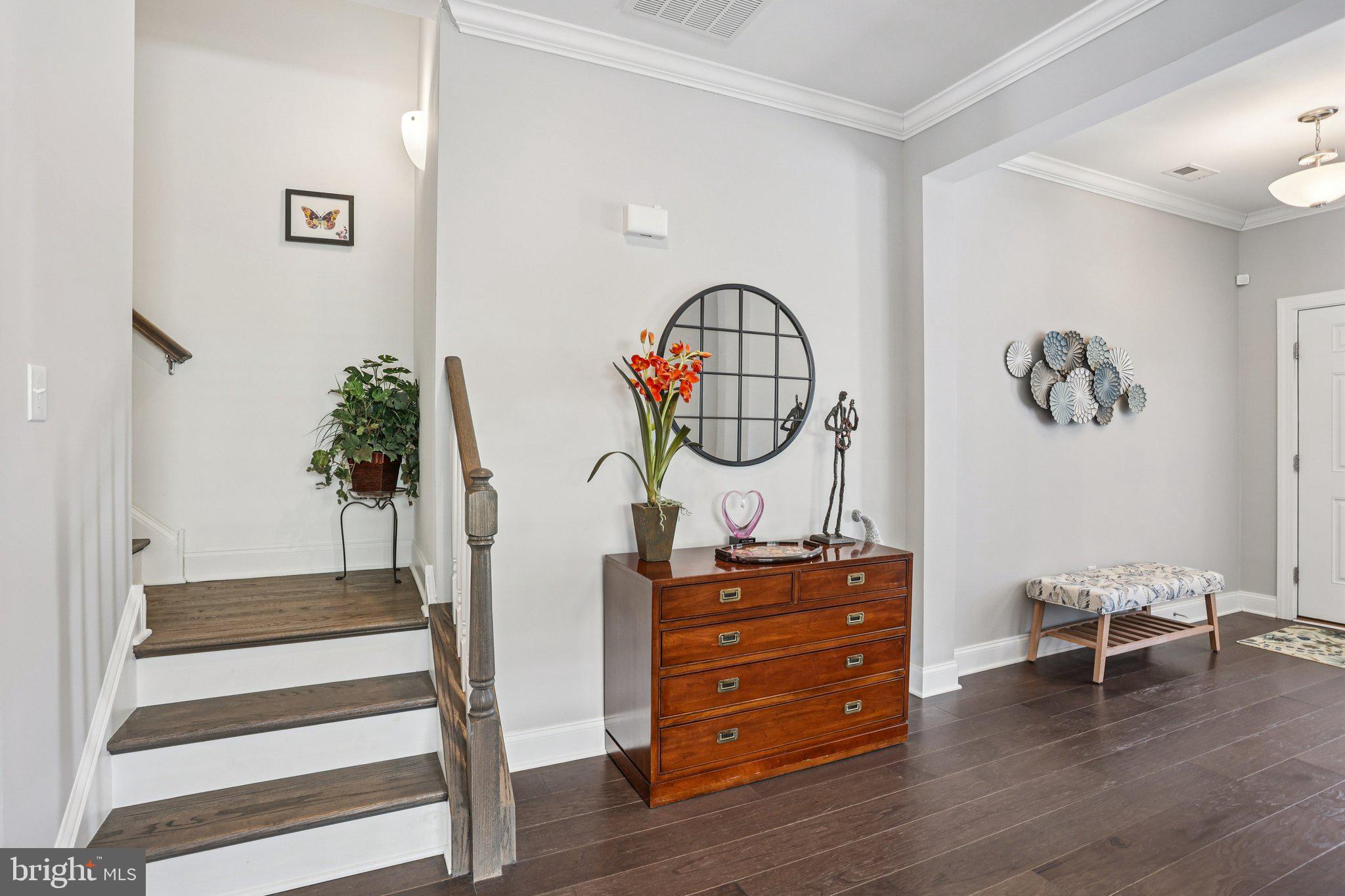 38 Tower Boulevard Mount Holly, NJ 08060 - Photo 9 of 42 a view of a hallway with wooden floor and staircase