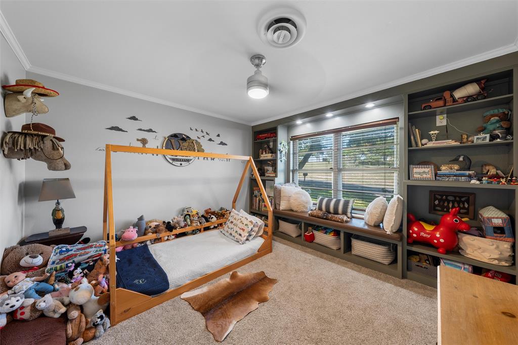 6224 Summit Ridge Drive Waco, TX 76710 - Photo 14 of 25 a living room with furniture and a flat screen tv