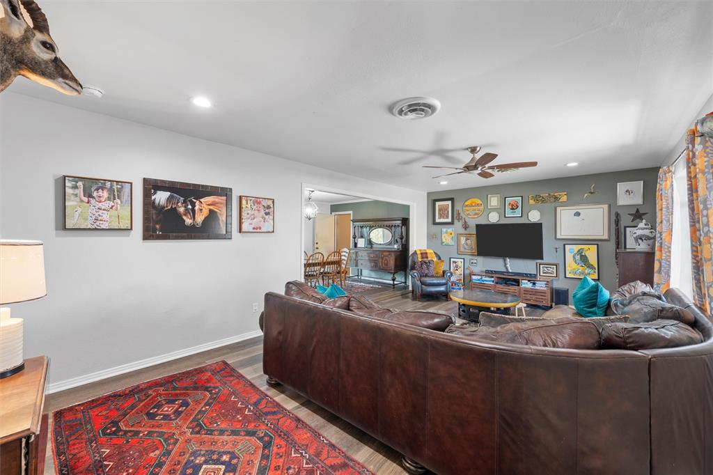 6224 Summit Ridge Drive Waco, TX 76710 - Photo 4 of 25 a living room with furniture and a flat screen tv