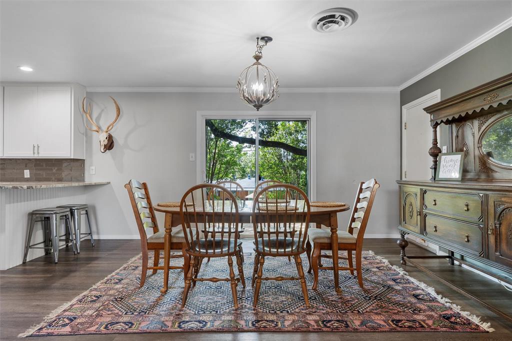 6224 Summit Ridge Drive Waco, TX 76710 - Photo 6 of 25 a view of a dining room with furniture window and wooden floor