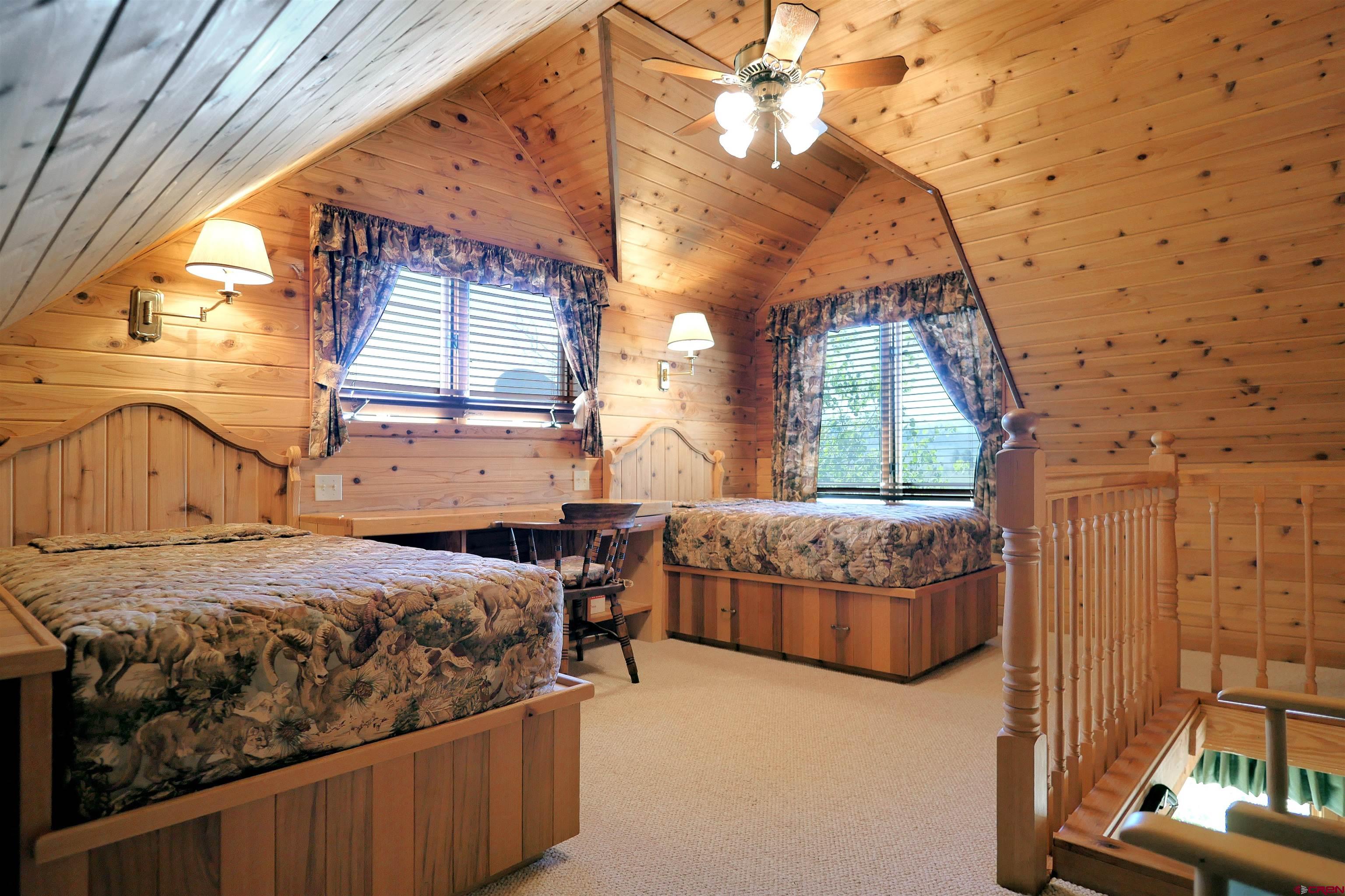 2425 62x Road Placerville, CO 81430 - Photo 23 of 30 a bedroom with a bed and a window