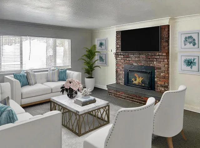 a view of a big yard with plants and large tree