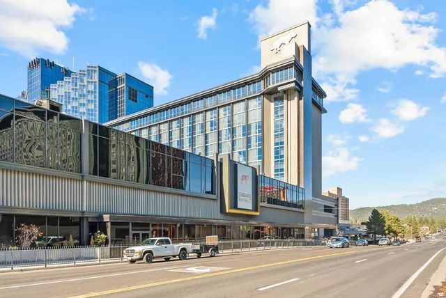 a view of swimming pool with a garden and mountain view