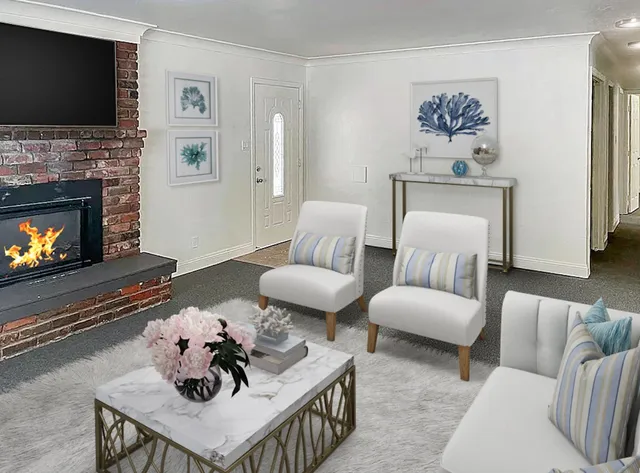 a view of a house with backyard and sitting area