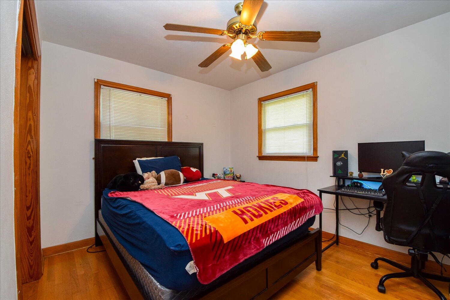 1518 Mountain View Road Vinton, VA 24179 - Photo 12 of 25 a bedroom with a bed and a desk