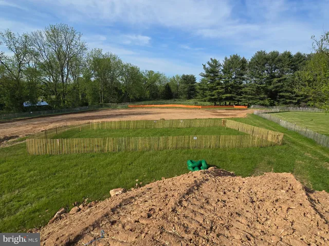 a view of a golf course with a lake