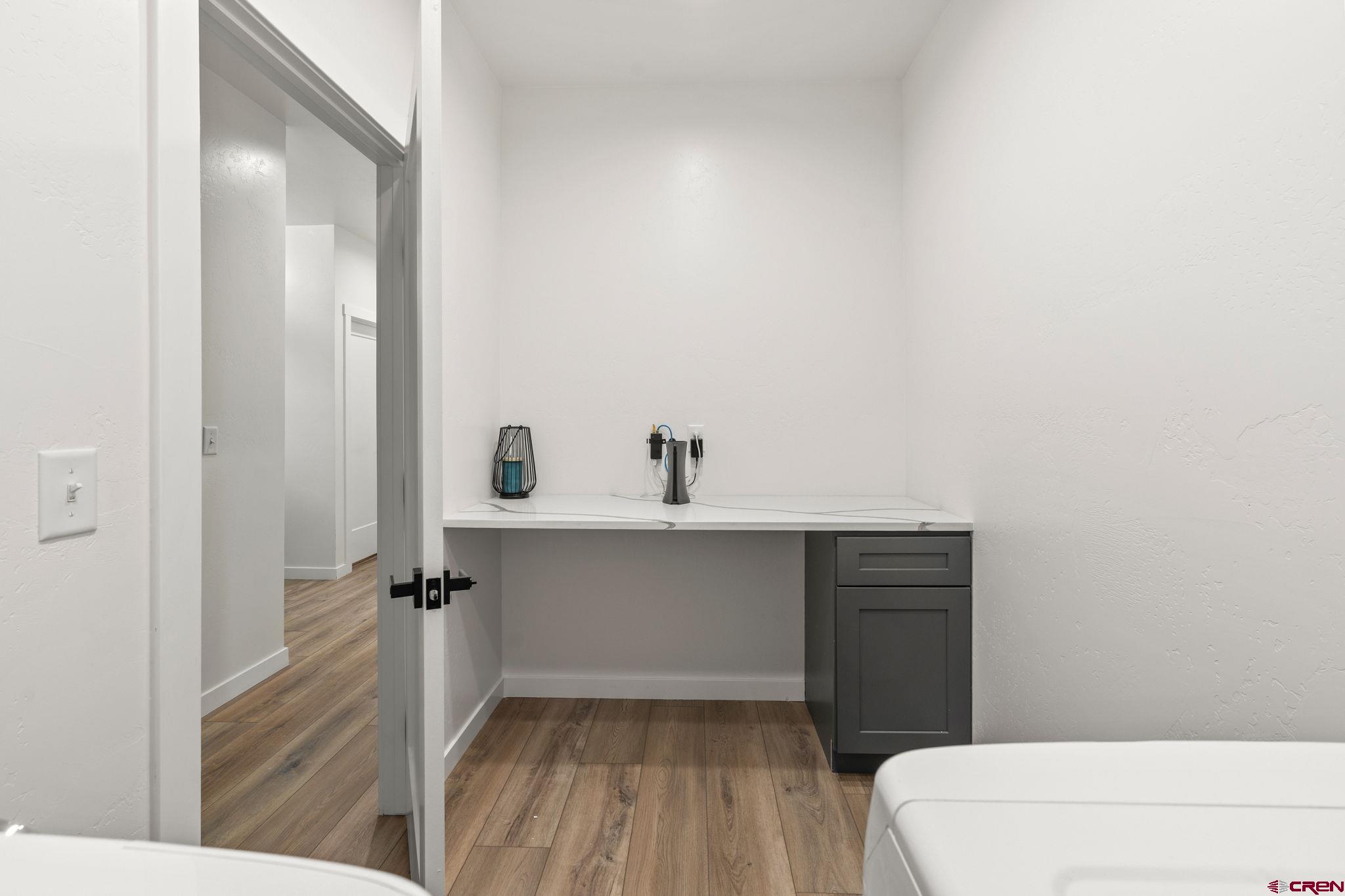 1517 Golf Course Lane Cortez, CO 81321 - Photo 30 of 41 a bathroom with a sink a toilet and shower