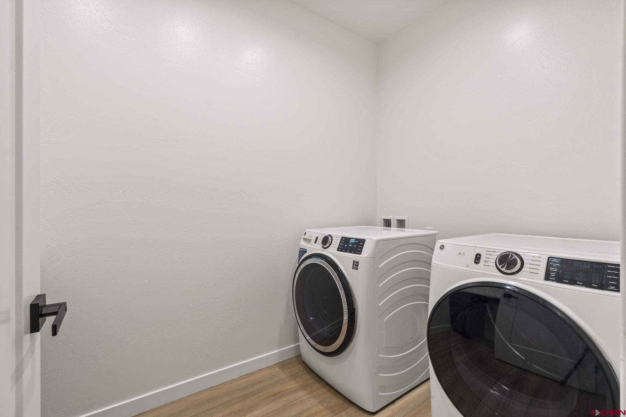 1517 Golf Course Lane Cortez, CO 81321 - Photo 31 of 41 a utility room with dryer and washer