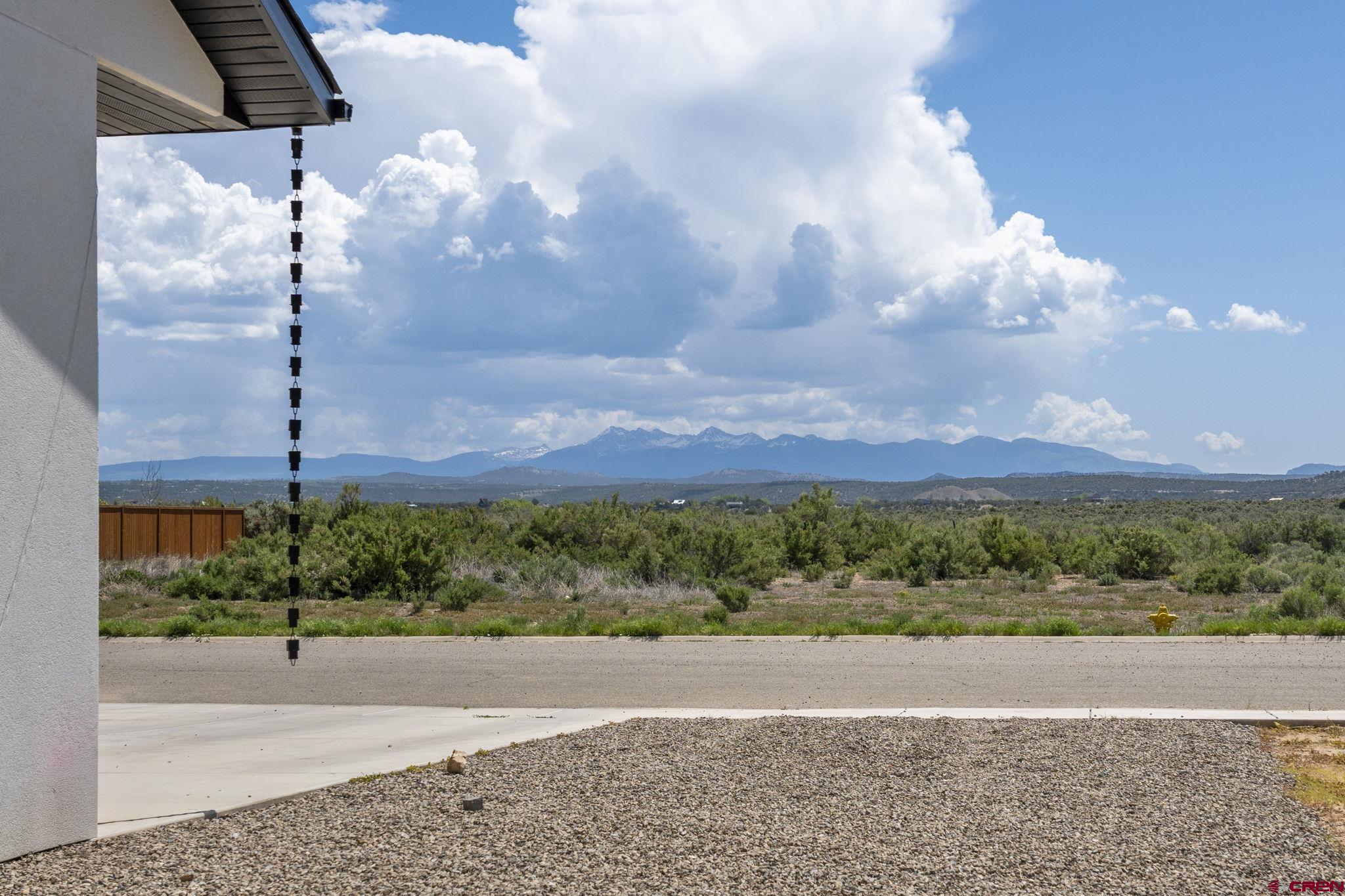 1517 Golf Course Lane Cortez, CO 81321 - Photo 39 of 41 a view of a street with a houses