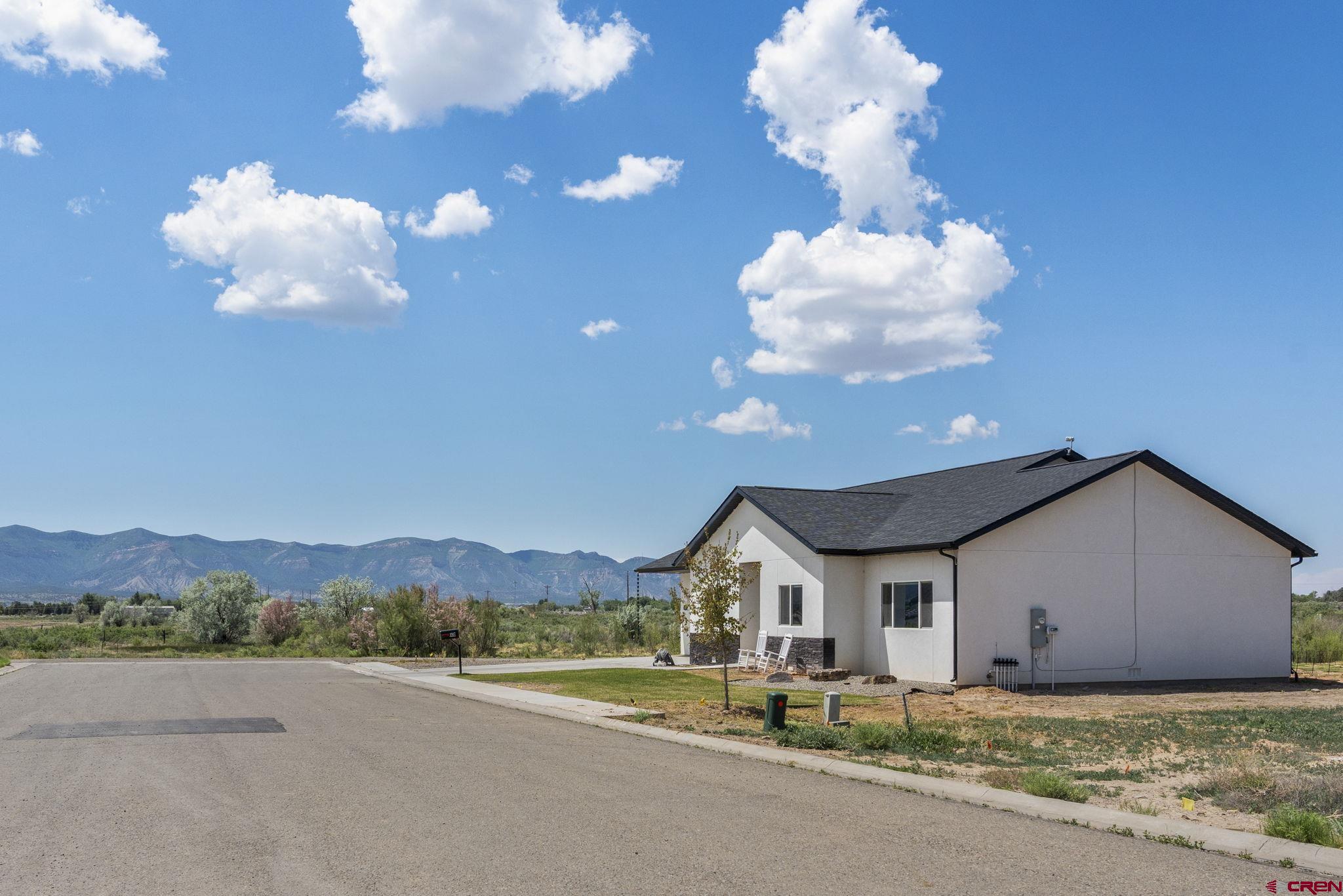 1517 Golf Course Lane Cortez, CO 81321 - Photo 41 of 41 a view of a house with a yard