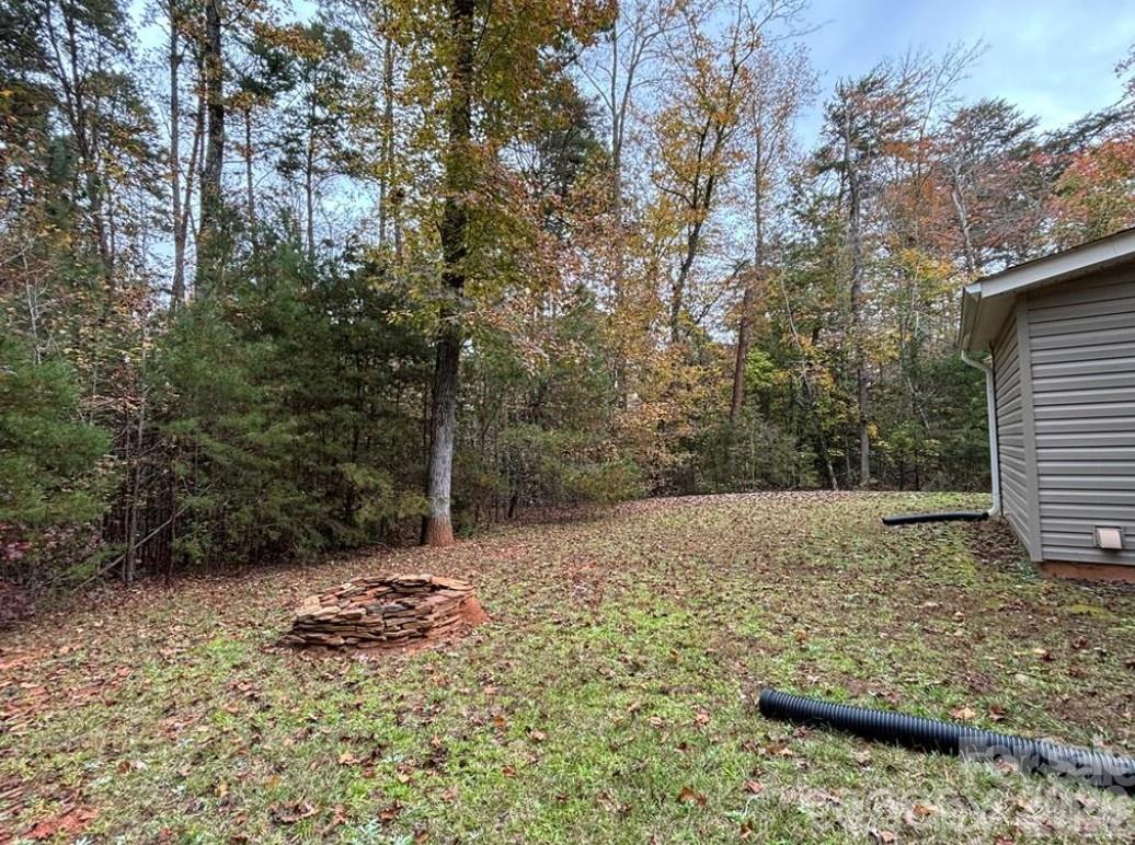 369 Pinecrest Circle Troy, NC 27371 - Photo 18 of 19 a view of a backyard of the house