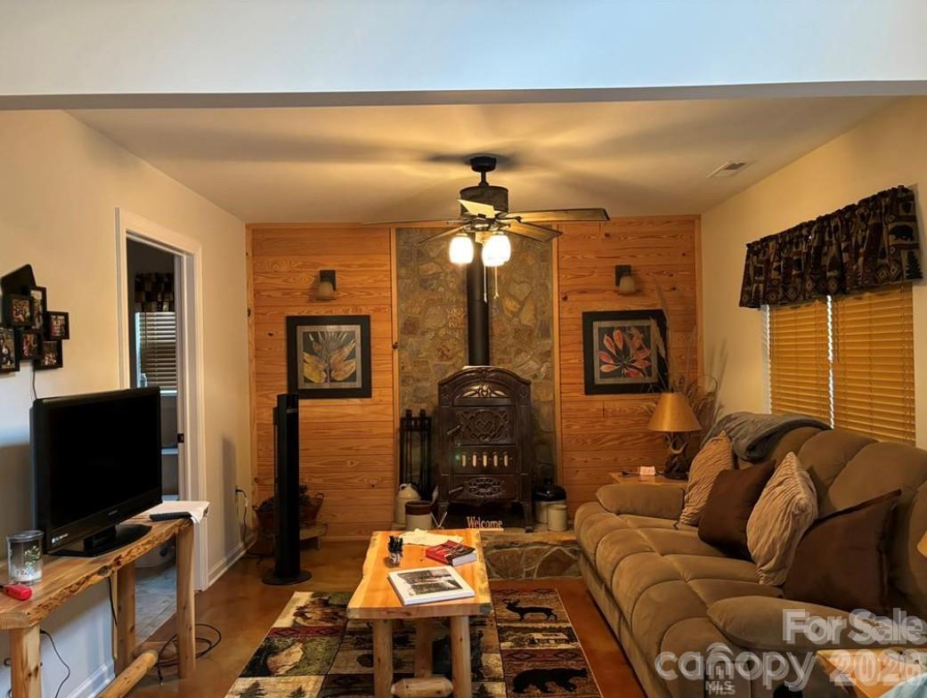 369 Pinecrest Circle Troy, NC 27371 - Photo 5 of 19 a living room with furniture and a flat screen tv