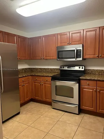 $400,000 | 11401 Northwest 89th Street, Unit 220, Doral, FL 33178