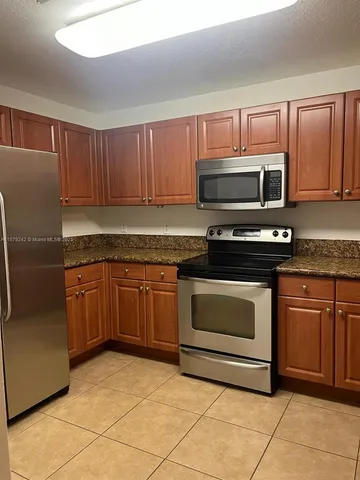 $410,000 | 11401 Northwest 89th Street, Unit 220, Doral, FL 33178