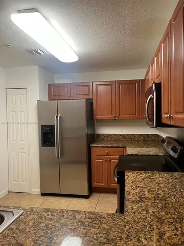 $410,000 | 11401 Northwest 89th Street, Unit 220, Doral, FL 33178