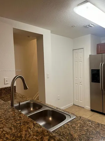 $410,000 | 11401 Northwest 89th Street, Unit 220, Doral, FL 33178