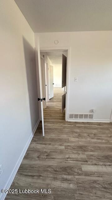 5110 46th Street Lubbock, TX 79414 - Photo 11 of 17 a view of a room with wooden floor