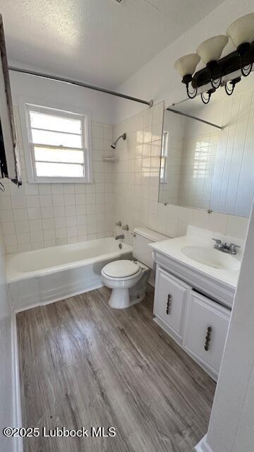 5110 46th Street Lubbock, TX 79414 - Photo 12 of 17 a bathroom with a sink a toilet and a bathtub