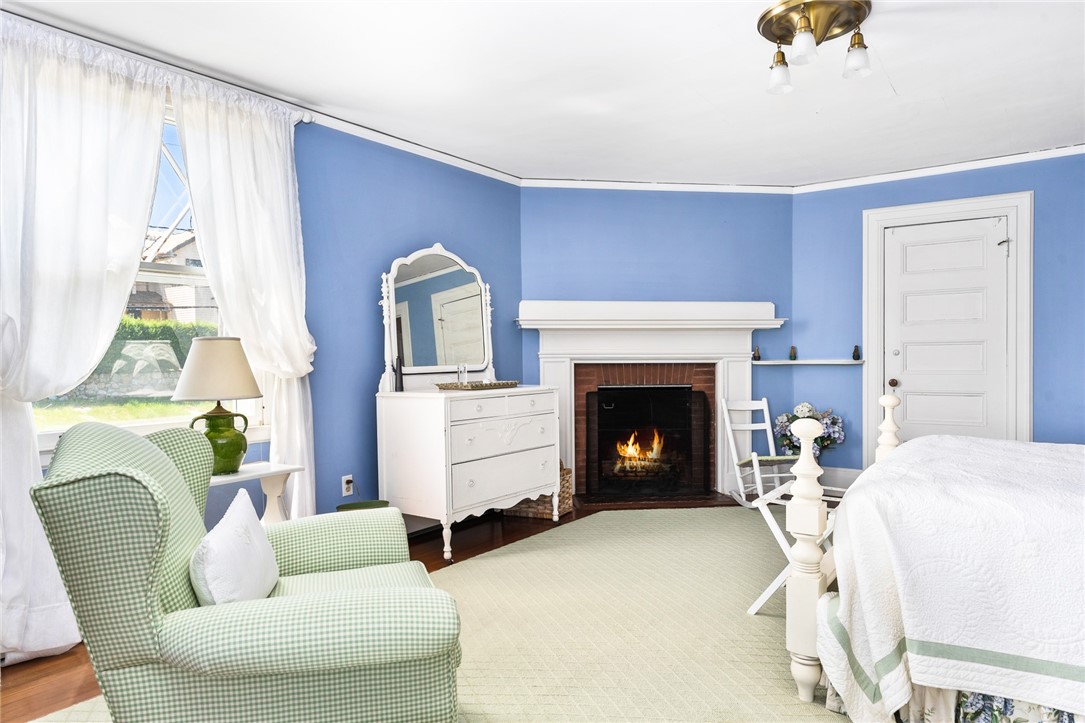 8 Westerly Road Westerly, RI 02891 - Photo 30 of 41 Lovely guest bedroom with fireplace