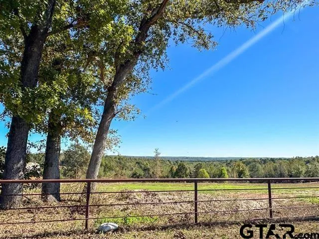 a view of a lake with a big yard
